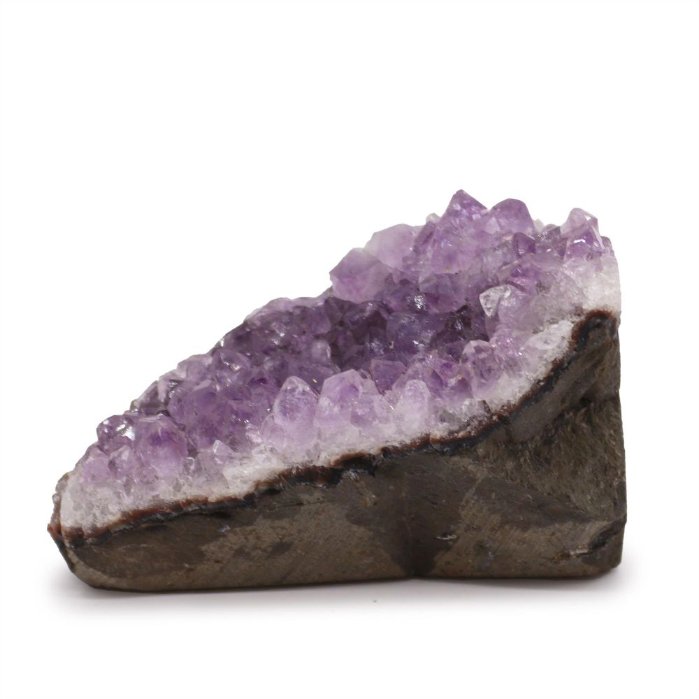 A high-grade amethyst standing cluster with deep violet crystals, set against a dark matrix.