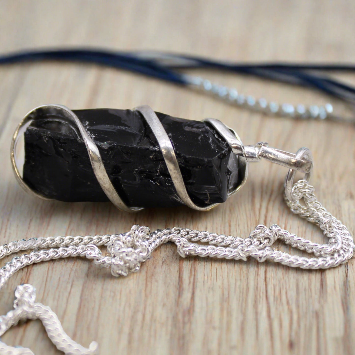 Cascade Wrapped Gemstone necklace collection