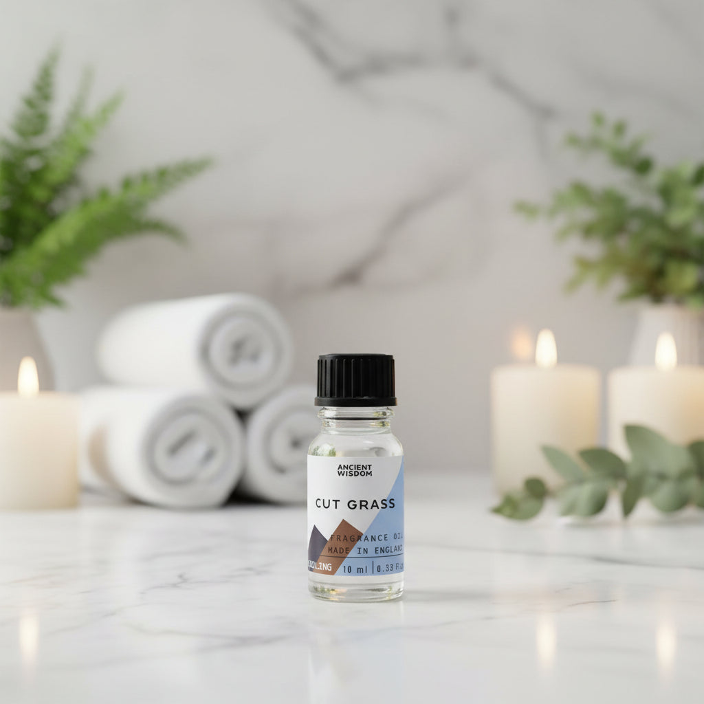 A 10ml bottle of 'Pine' fragrance oil by Ancient Wisdom, with a label indicating it is cooling scented, made in England.