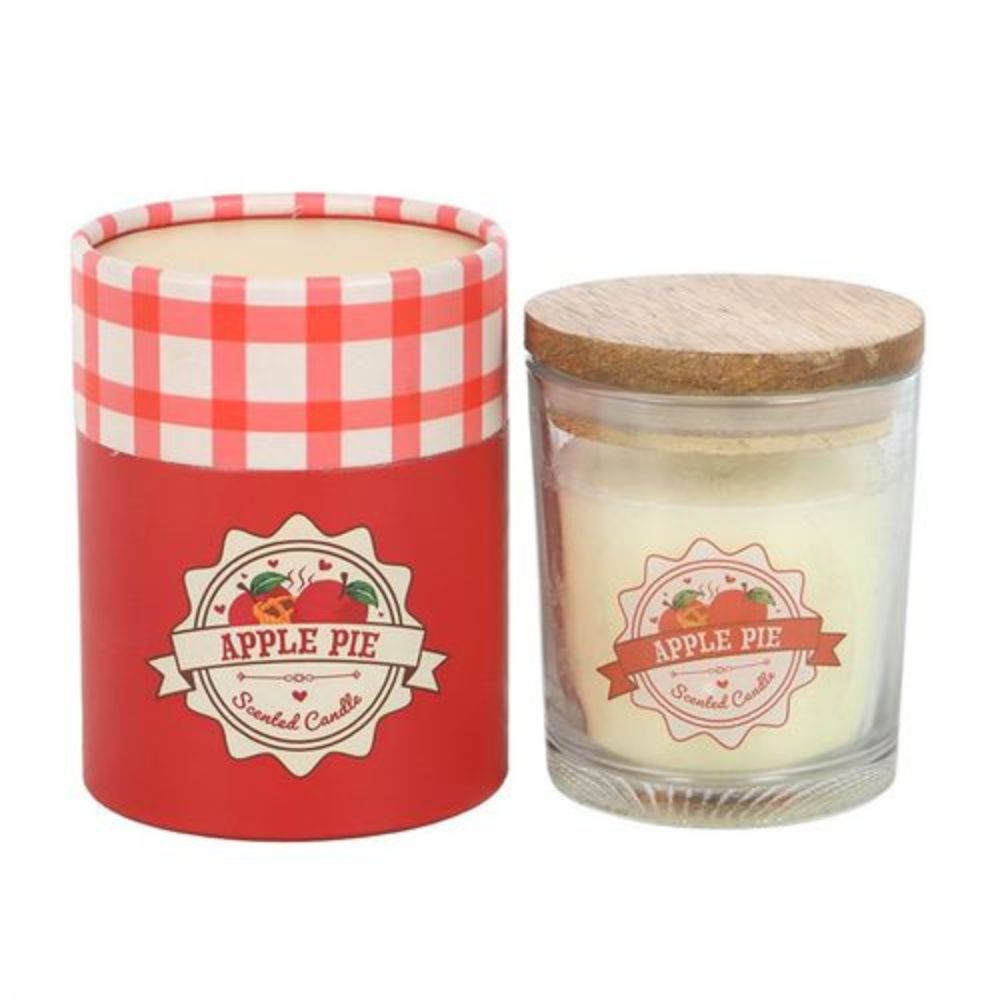 Candle with 'Apple Pie' label in a glass jar and red checkered lid, next to its packaging.