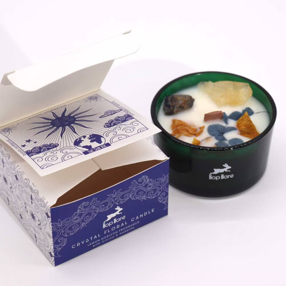 Crystal floral candle in a decorative box on a white background