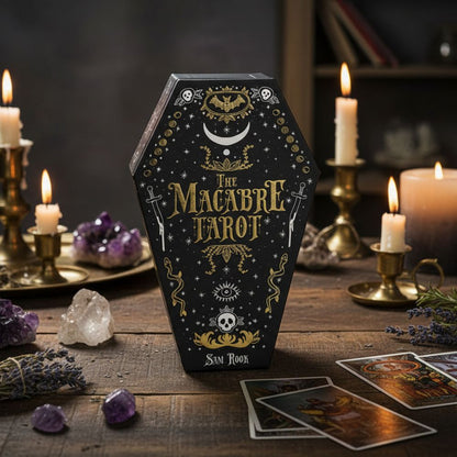 Macabre Tarot box with tarot cards and candles on a wooden table
